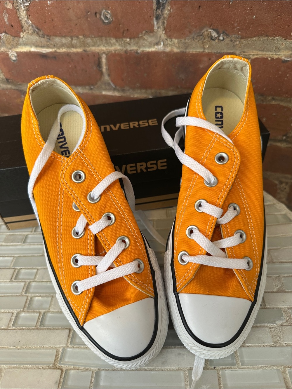 Converse “Orange Ray” Low Top Canvas Sneakers